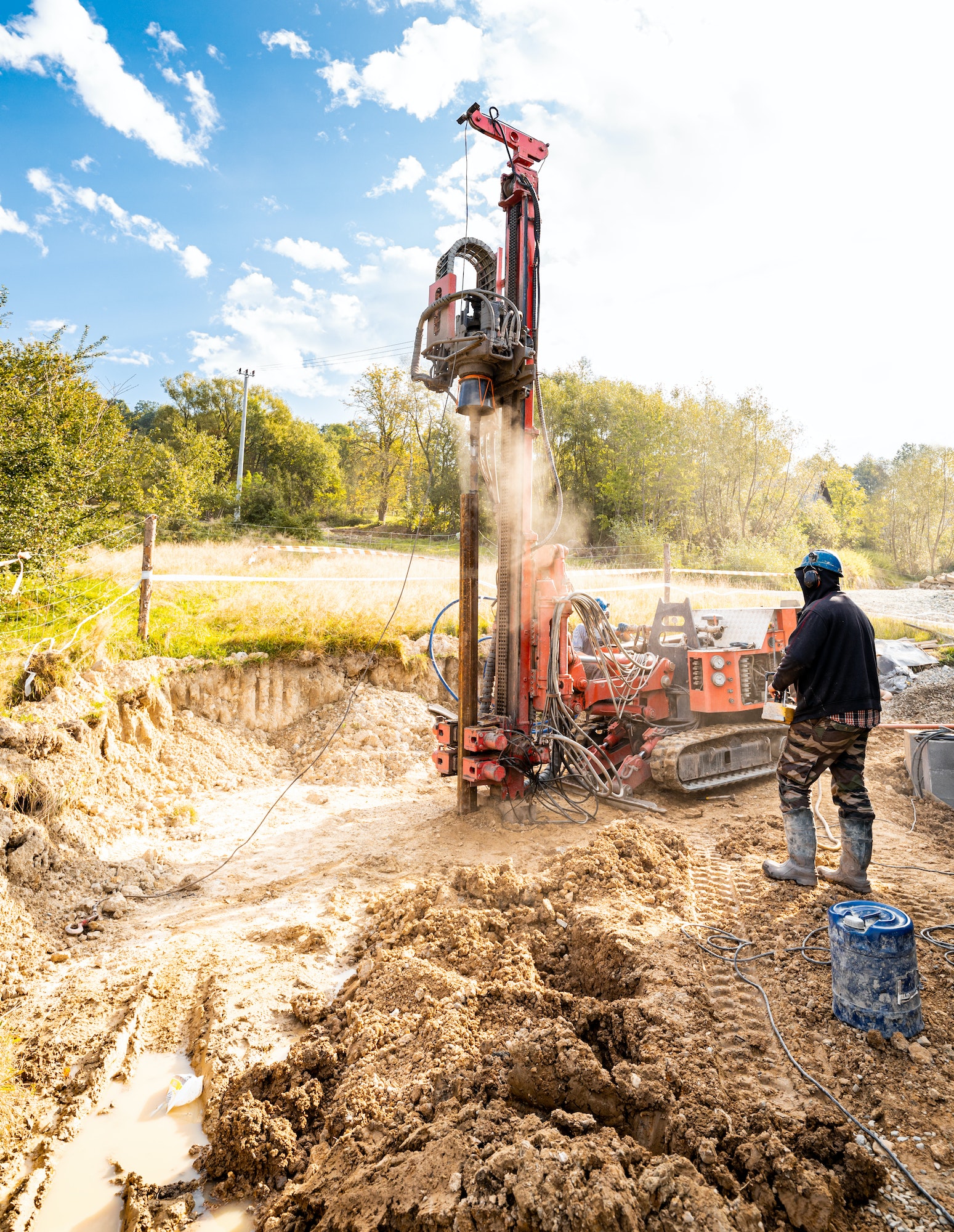 Drilling wells in the ground using a professional drill and machine